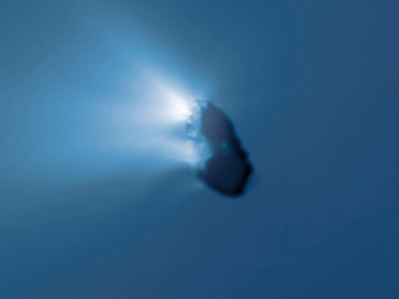 Halley's Comet nucleus captured by Giotto spacecraft showing jets of material erupting from its surface